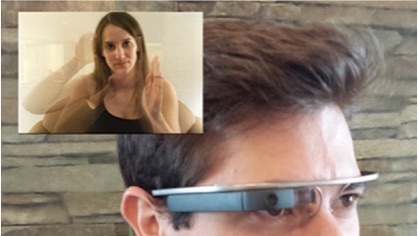 Man wearing a Google Glass with a sign language video