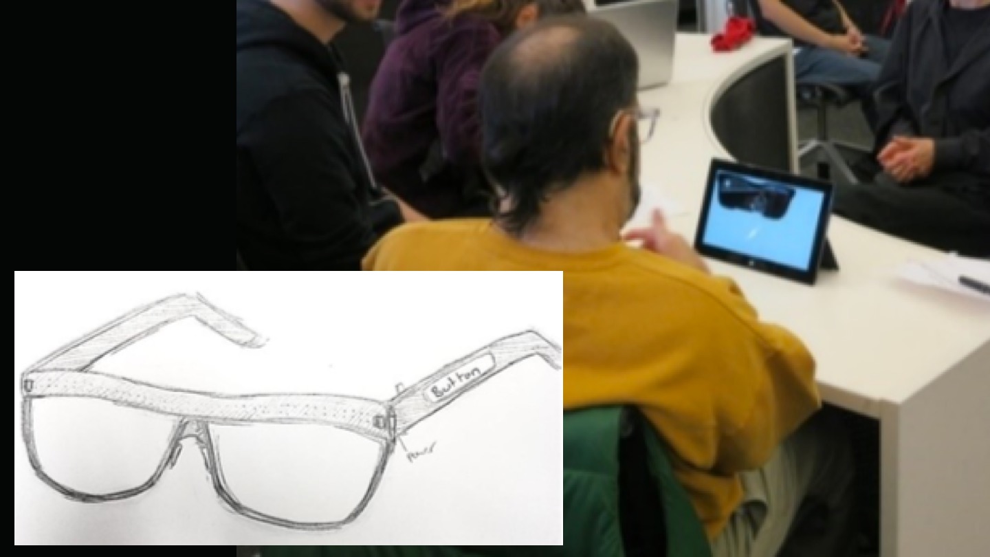 A computing student testing a set of prototype glasses.